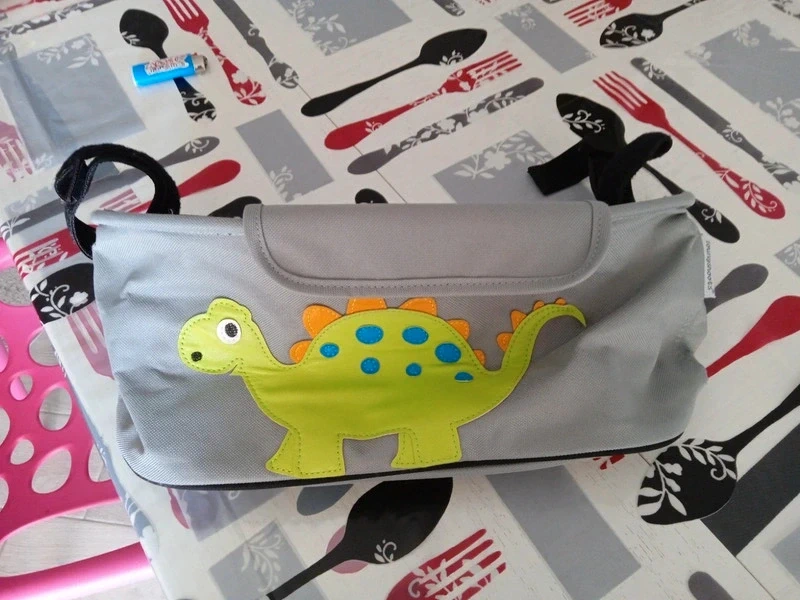 Portaoggetti passeggino dinosauro con velcro universale
